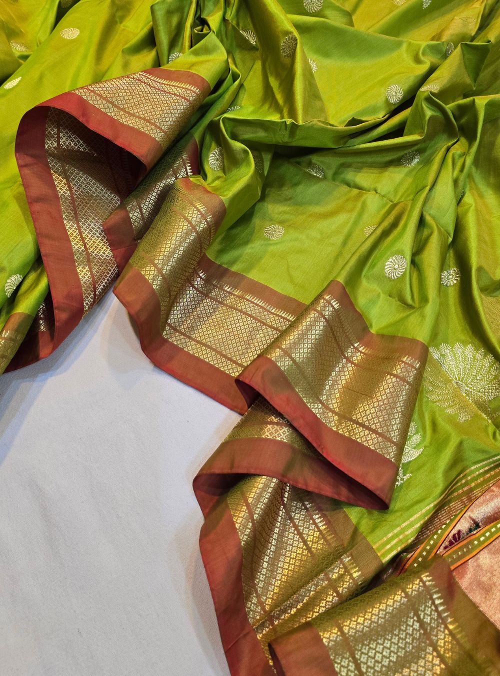 Parrot Green Tissue Elegance: The Coconut Border Paithani